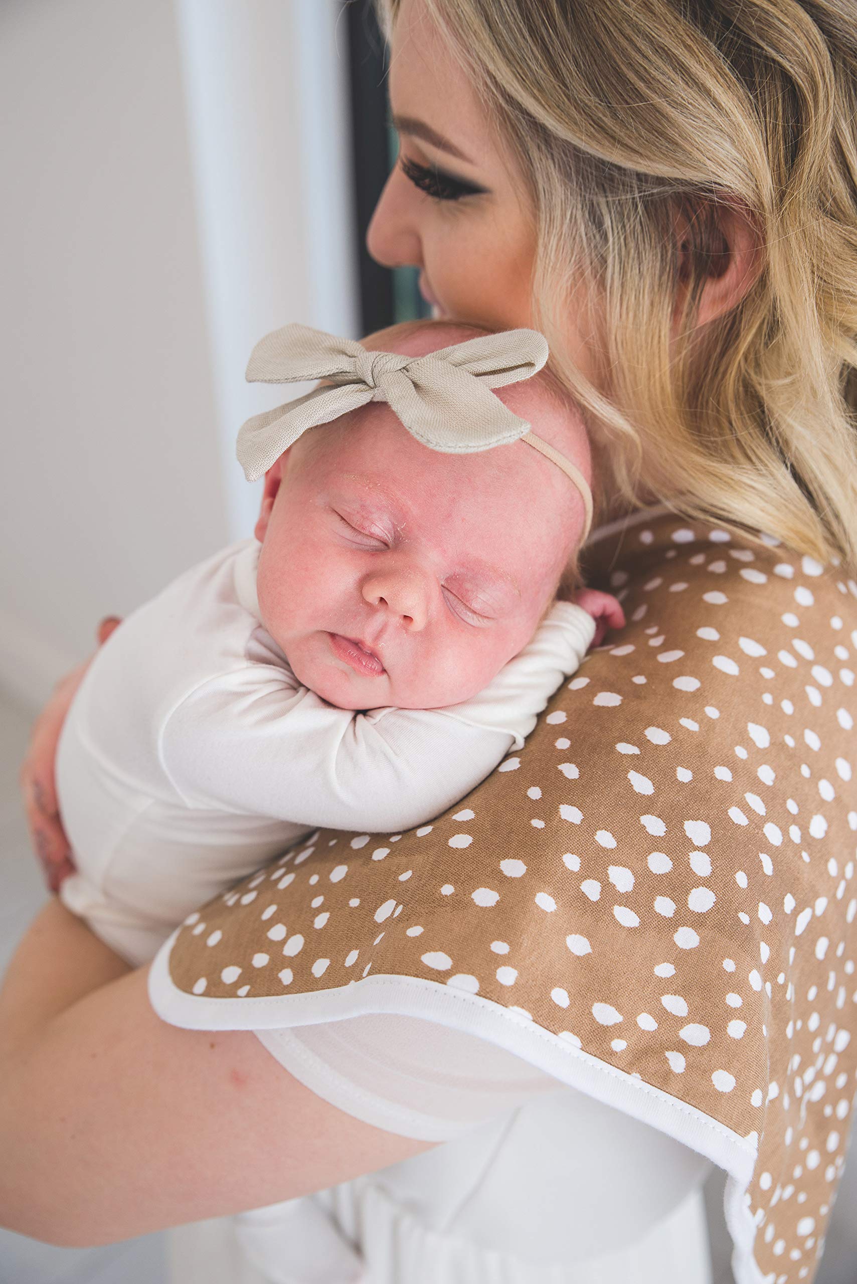 Copper Pearl three-layer burp cloth for high absorbency during feeds.