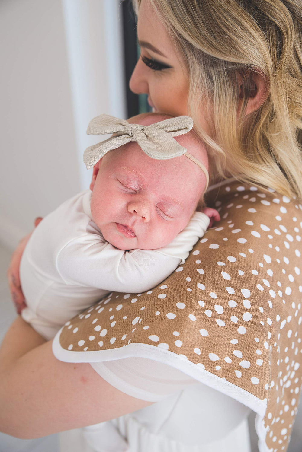Copper Pearl three-layer burp cloth for high absorbency during feeds.