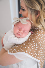 Copper Pearl three-layer burp cloth for high absorbency during feeds.