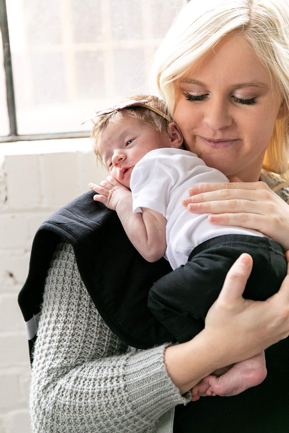 Copper Pearl machine-washable burp cloths make cleanup quick after feeds.