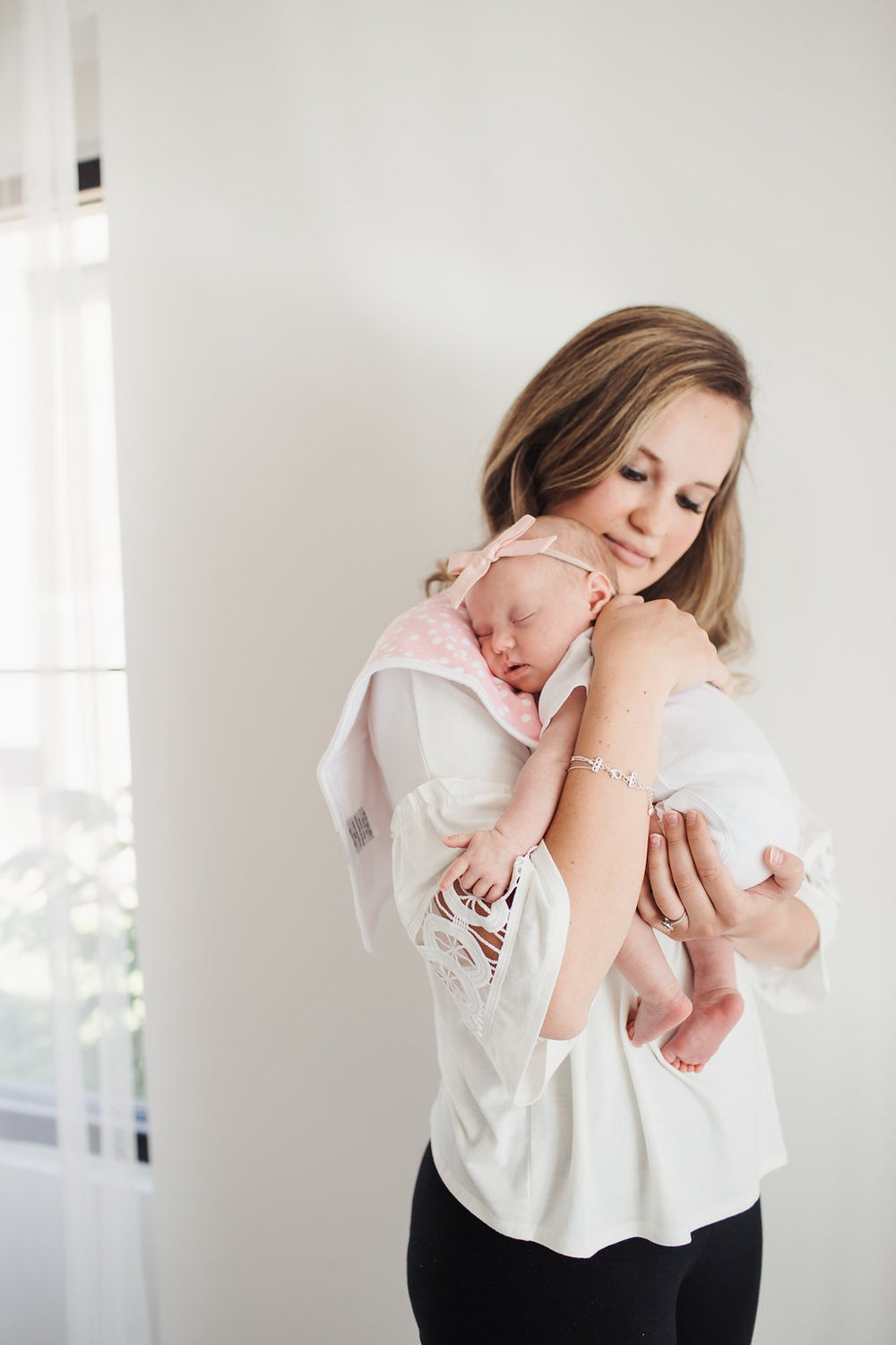 Copper Pearl burp cloths provide generous shoulder coverage during feeds