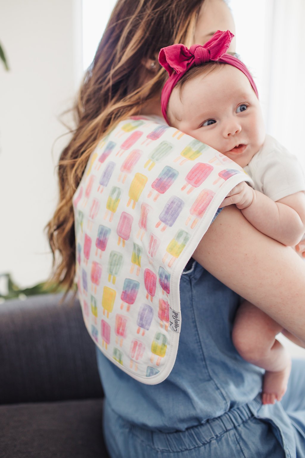 Copper Pearl burp cloths feature trendy prints to match nursery style