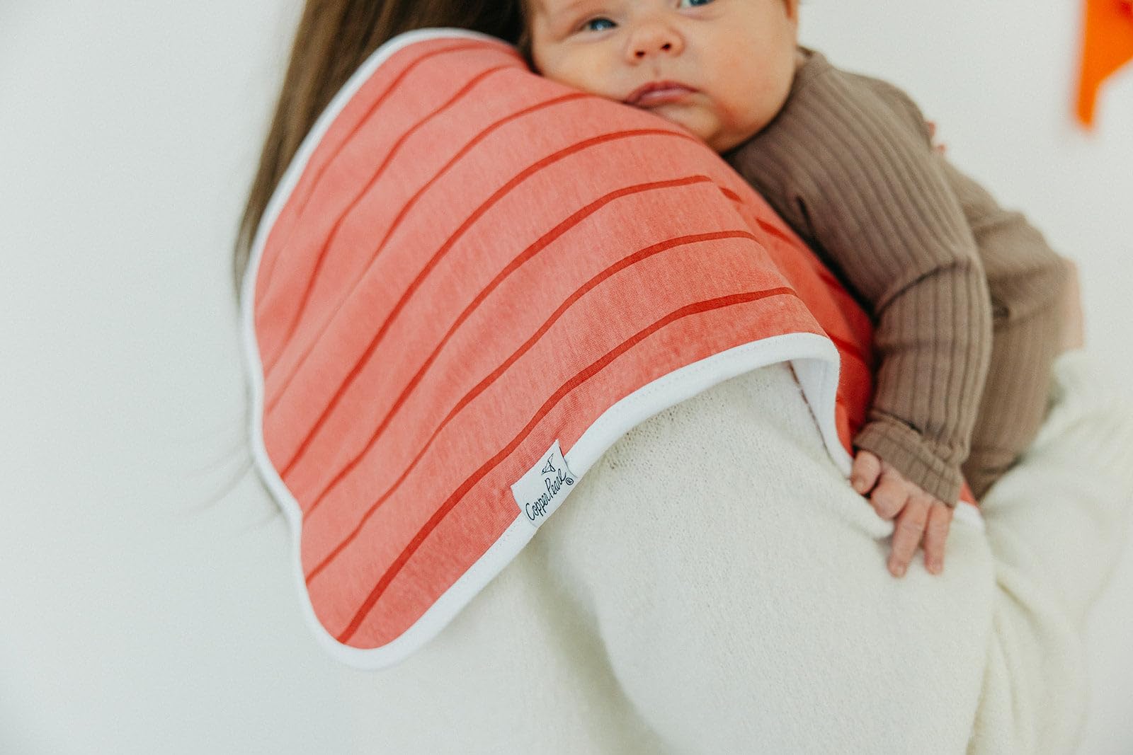Copper Pearl large 21x10 cloths reduce outfit changes during burping.