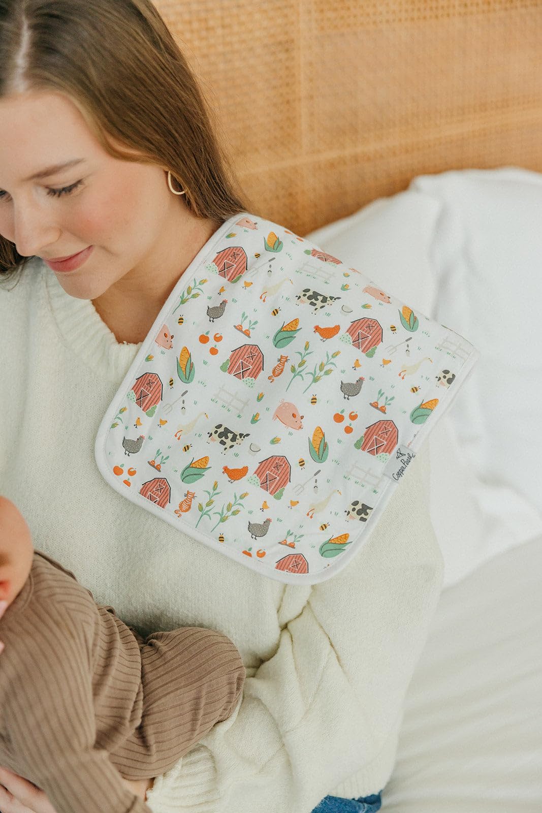 Copper Pearl machine-washable burp cloths simplify post-meal cleanup.