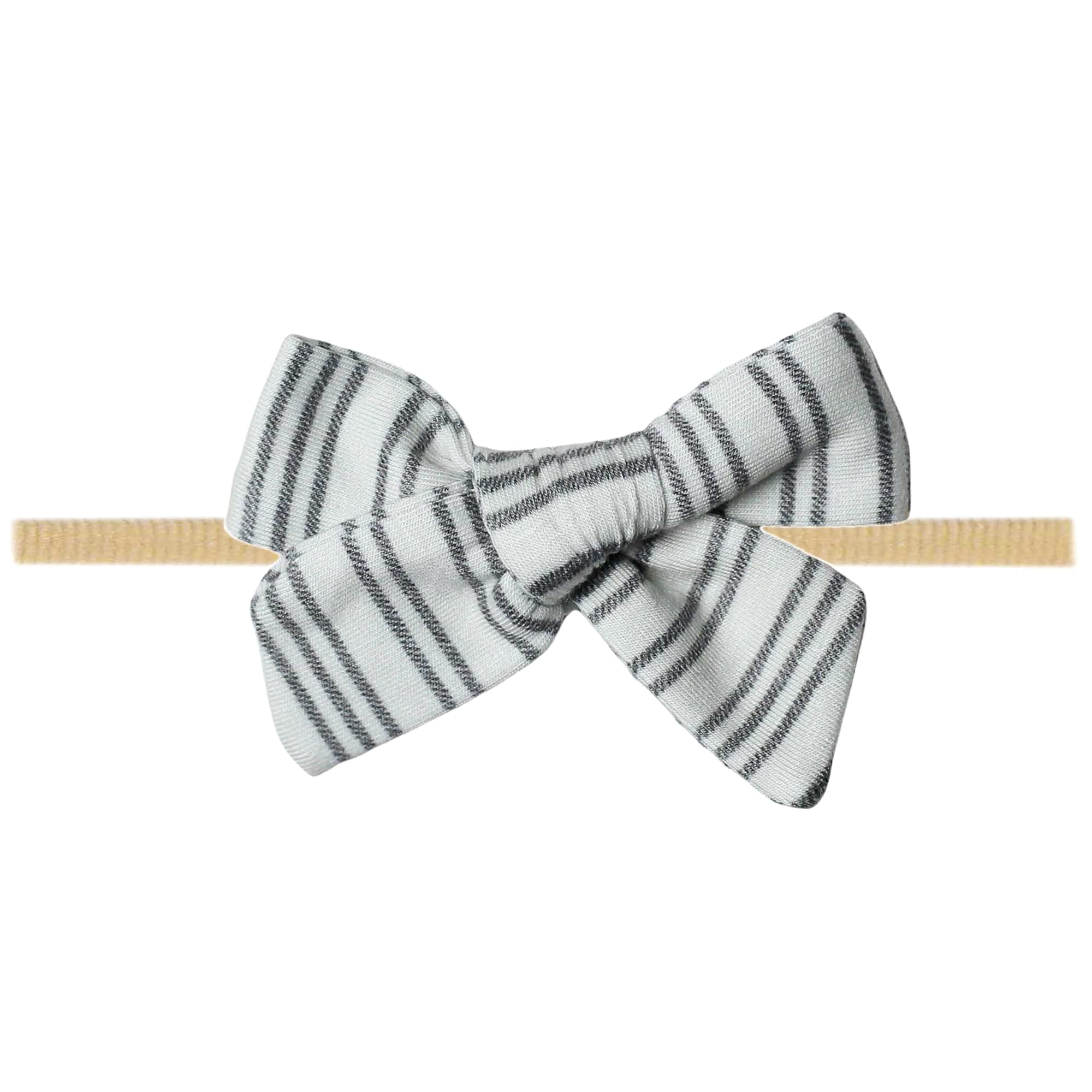 Copper Pearl Classic Baby Bow Midtown worn on a newborn for gentle comfort.
