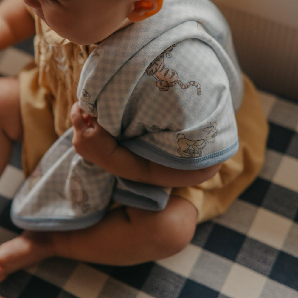 Copper Pearl compact 16x16 blanket fits neatly in a diaper bag.