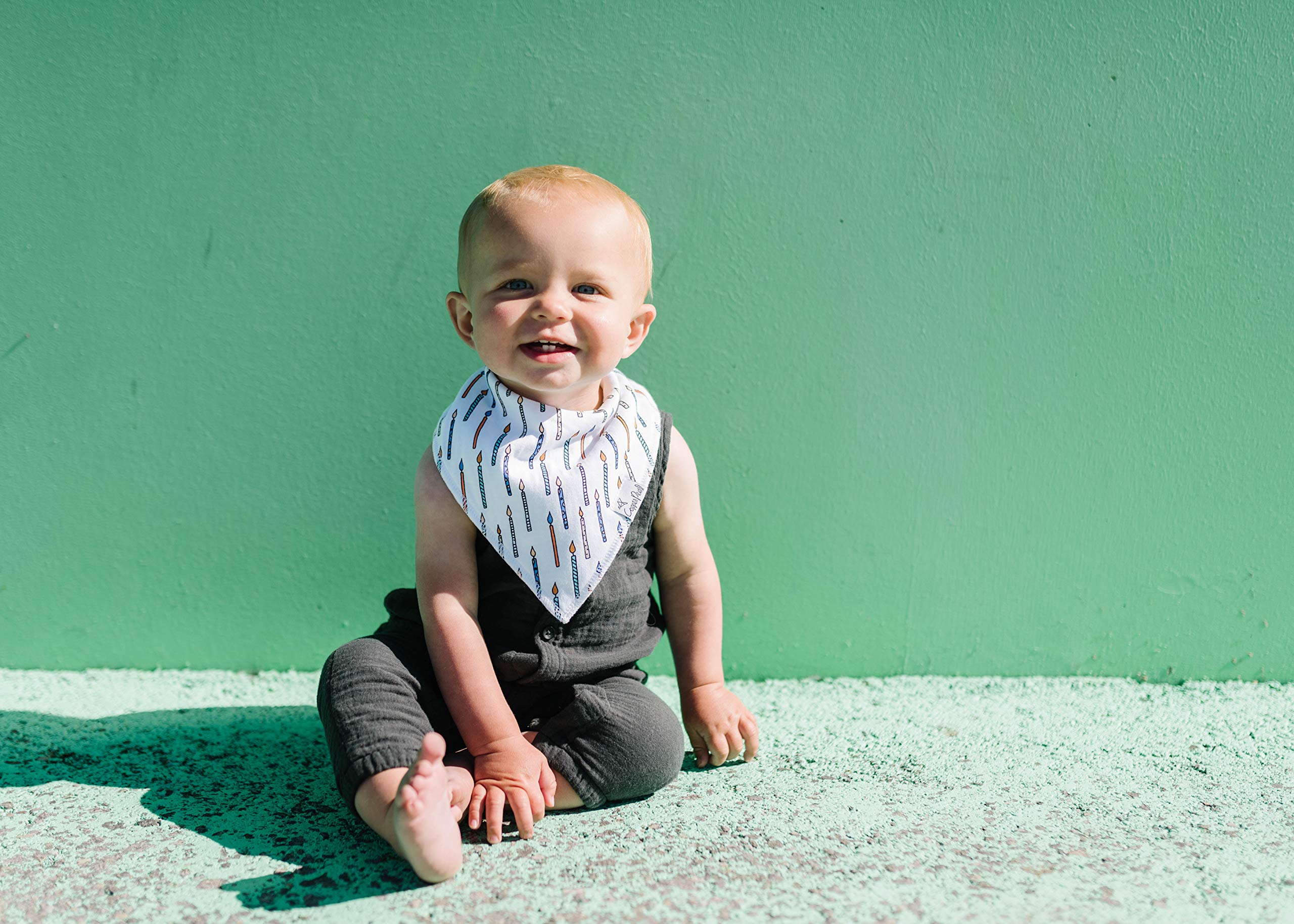 Copper Pearl Confetti bib being machine washed shows easy care for busy parents.
