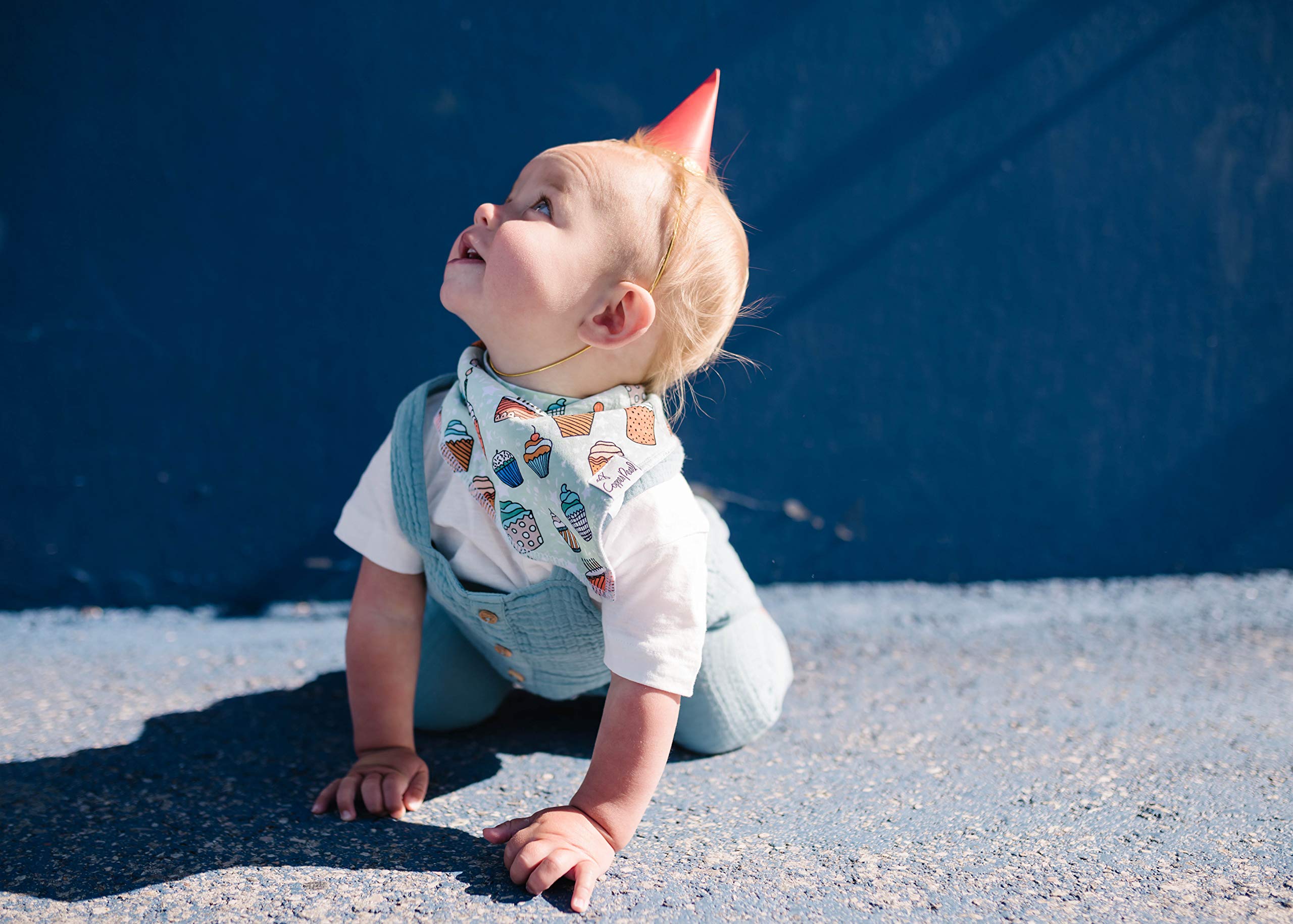 Copper Pearl Confetti bib worn by baby demonstrates style meeting function.