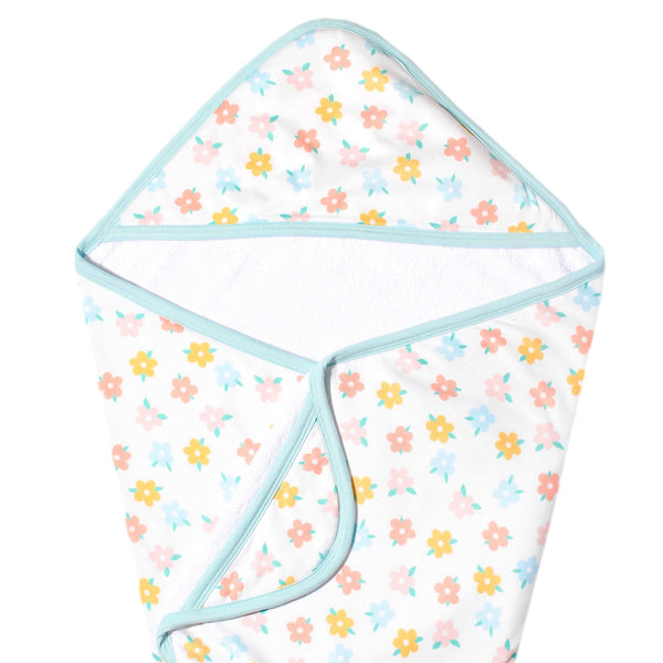Copper Pearl Daisy hooded bath towel keeps baby warm after bath.