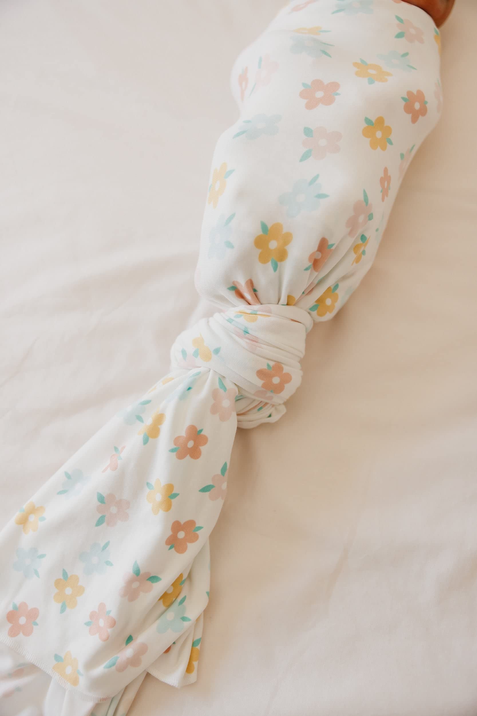 Copper Pearl Daisy receiving blanket offers extra warmth and layering.