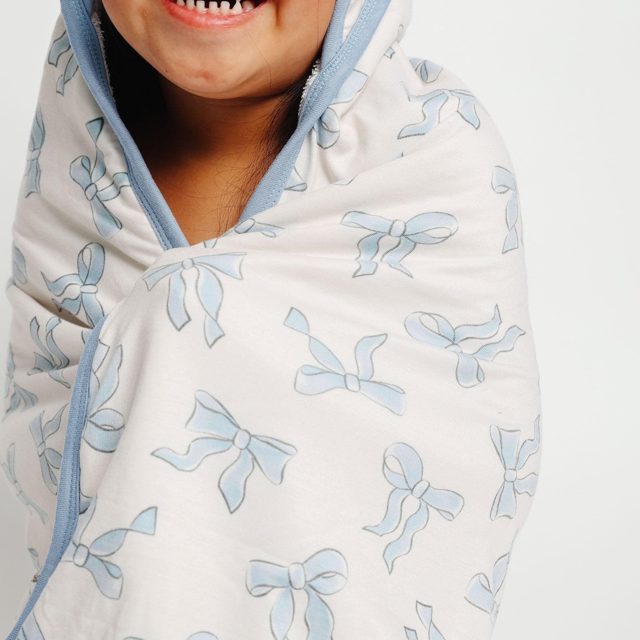 Copper Pearl Daphne Knit Hooded Towel inside lining reveals plush terry absorbency