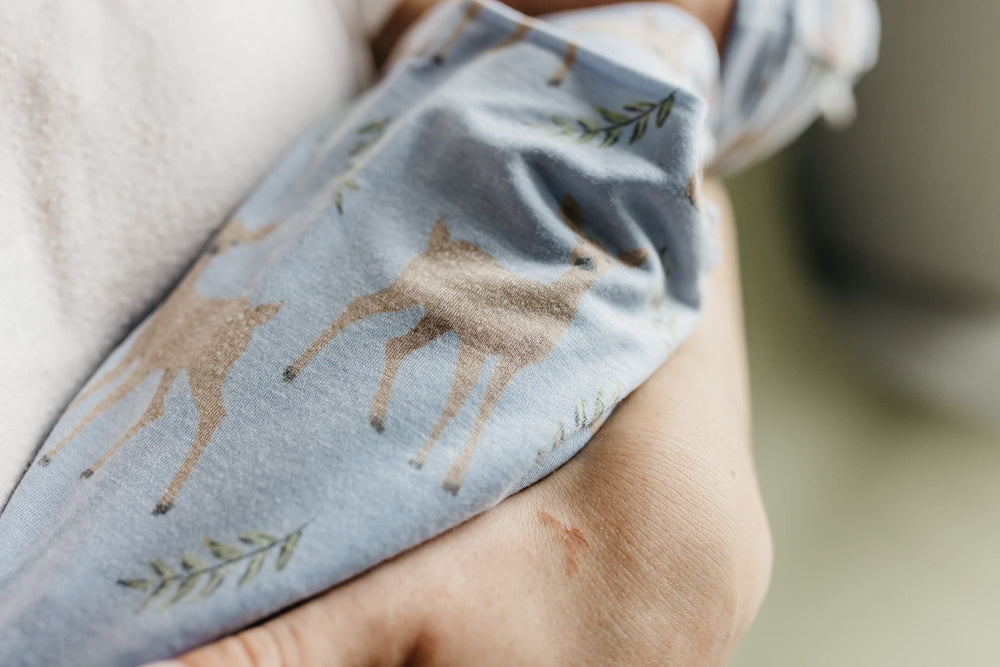 Close-up of the knit texture on the Copper Pearl Doe blanket.