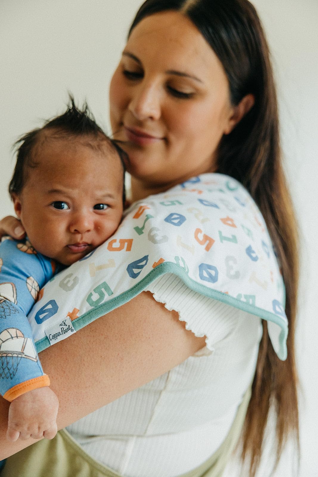 Copper Pearl easy-care burp cloths are machine washable and quick to dry.