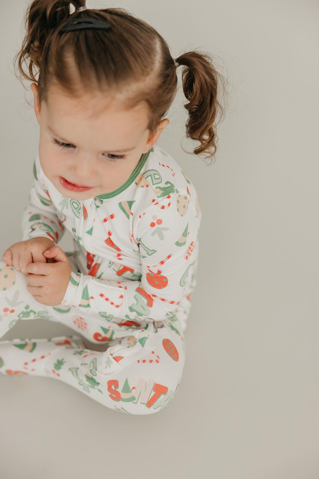 Premium knit fabric texture of Copper Pearl Elf footie pajama.