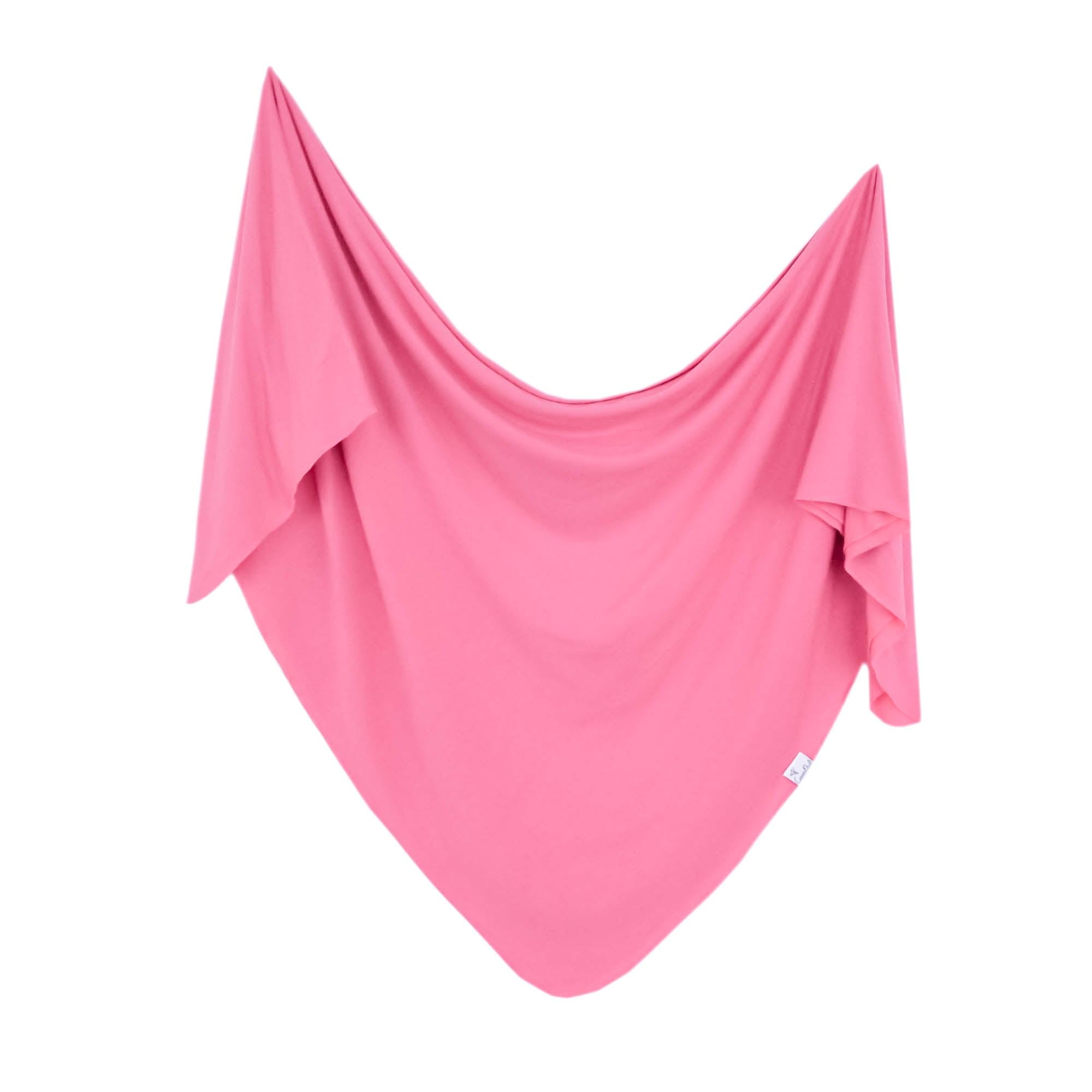 Copper Pearl Flamingo swaddle blanket 46in showcases soft, breathable knit fabric for newborn comfort.
