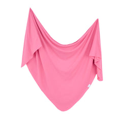 Copper Pearl Flamingo swaddle blanket 46in showcases soft, breathable knit fabric for newborn comfort.