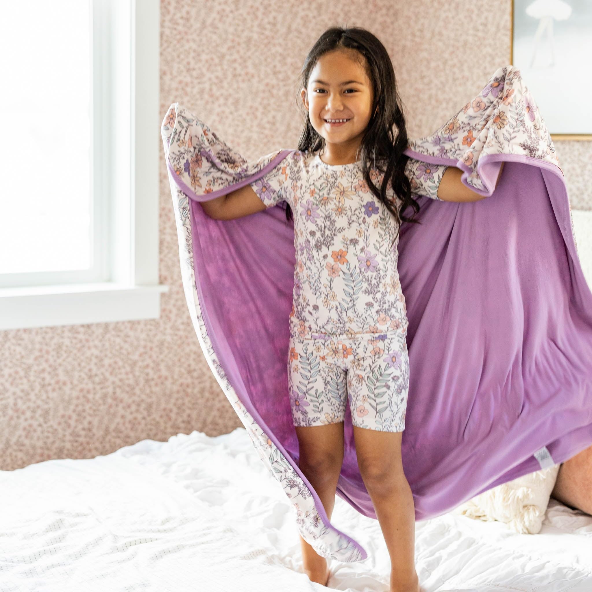 Copper Pearl Flora baby-snuggle blanket helps soothe during cuddle time.
