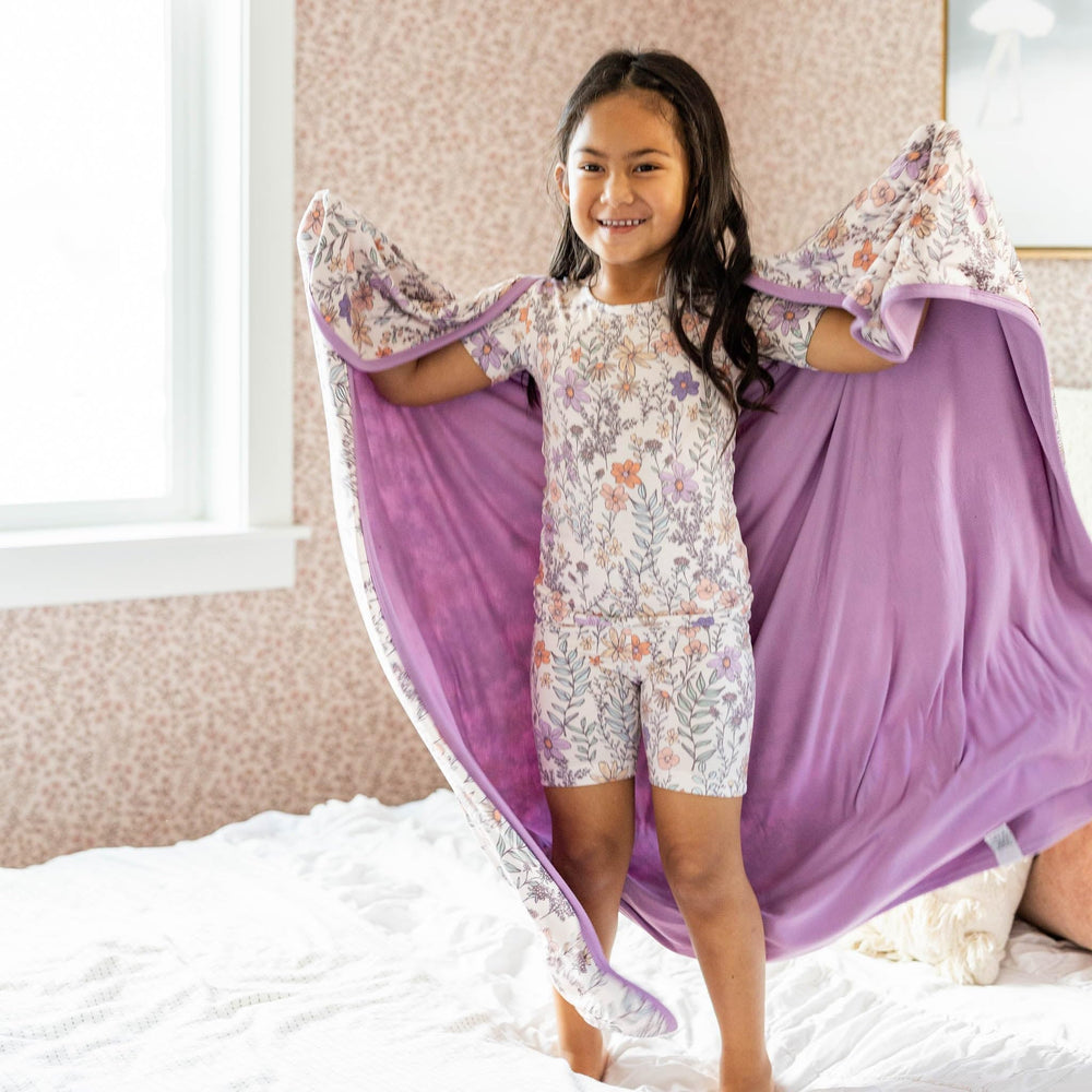 Copper Pearl Flora baby-snuggle blanket helps soothe during cuddle time.