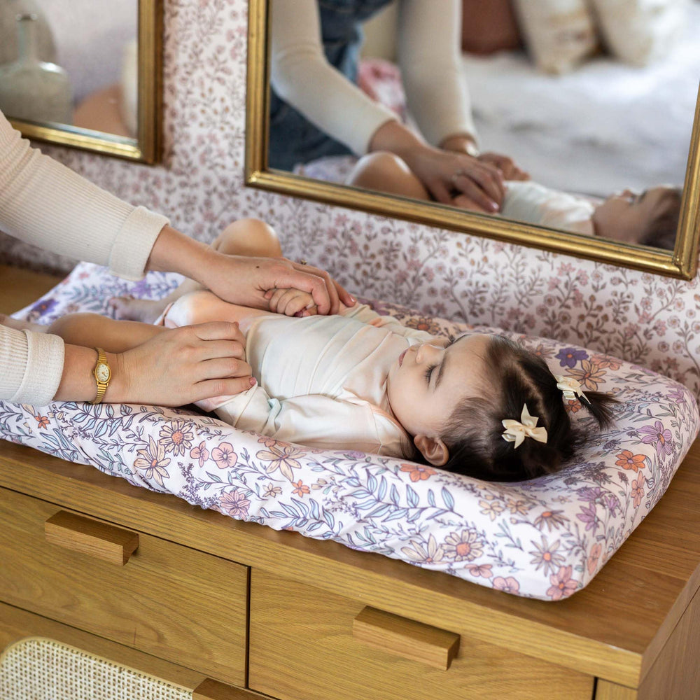 Copper Pearl Flora cover in a coordinated nursery setting with other decor.
