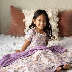 Copper Pearl Flora soft-knit-fabric highlighting breathable three-layer warmth for all seasons.