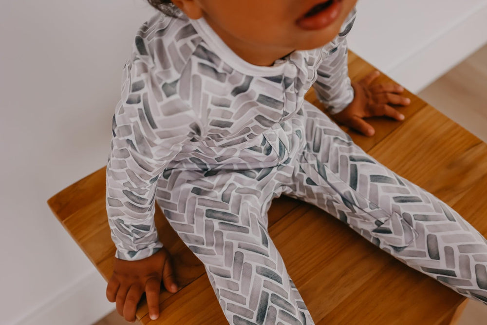 Copper Pearl footie pajamas with modern prints for stylish sleepwear
