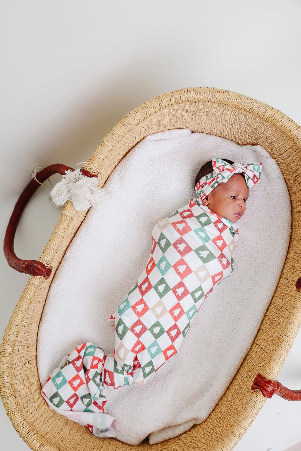Copper Pearl Fraser swaddle blanket closeup serged edges showing durable stitching.