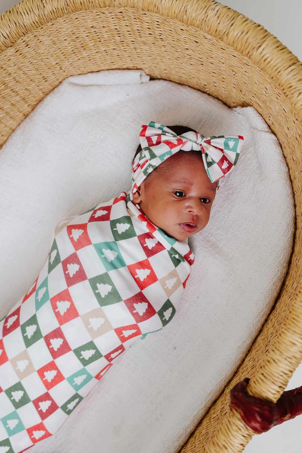Copper Pearl Fraser swaddle blanket laid flat, highlighting soft stretch and breathable knit.