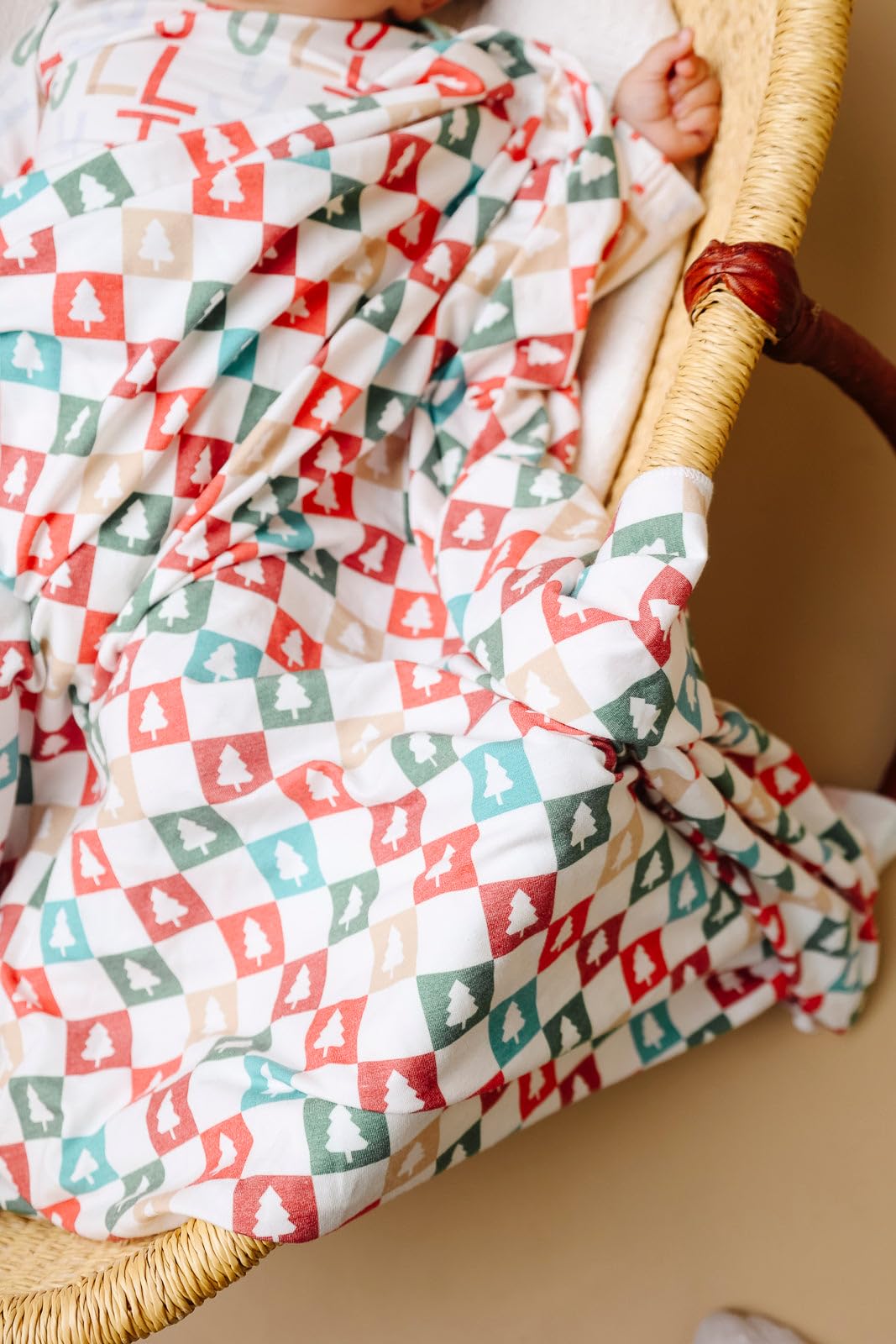 Copper Pearl Fraser swaddle blanket in gift-ready packaging.