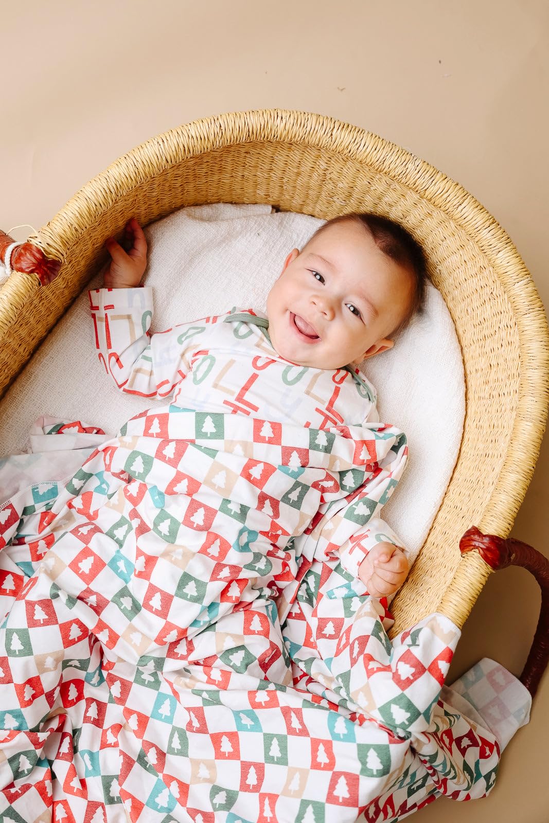 Copper Pearl Fraser swaddle blanket used during tummy time for soft comfort.