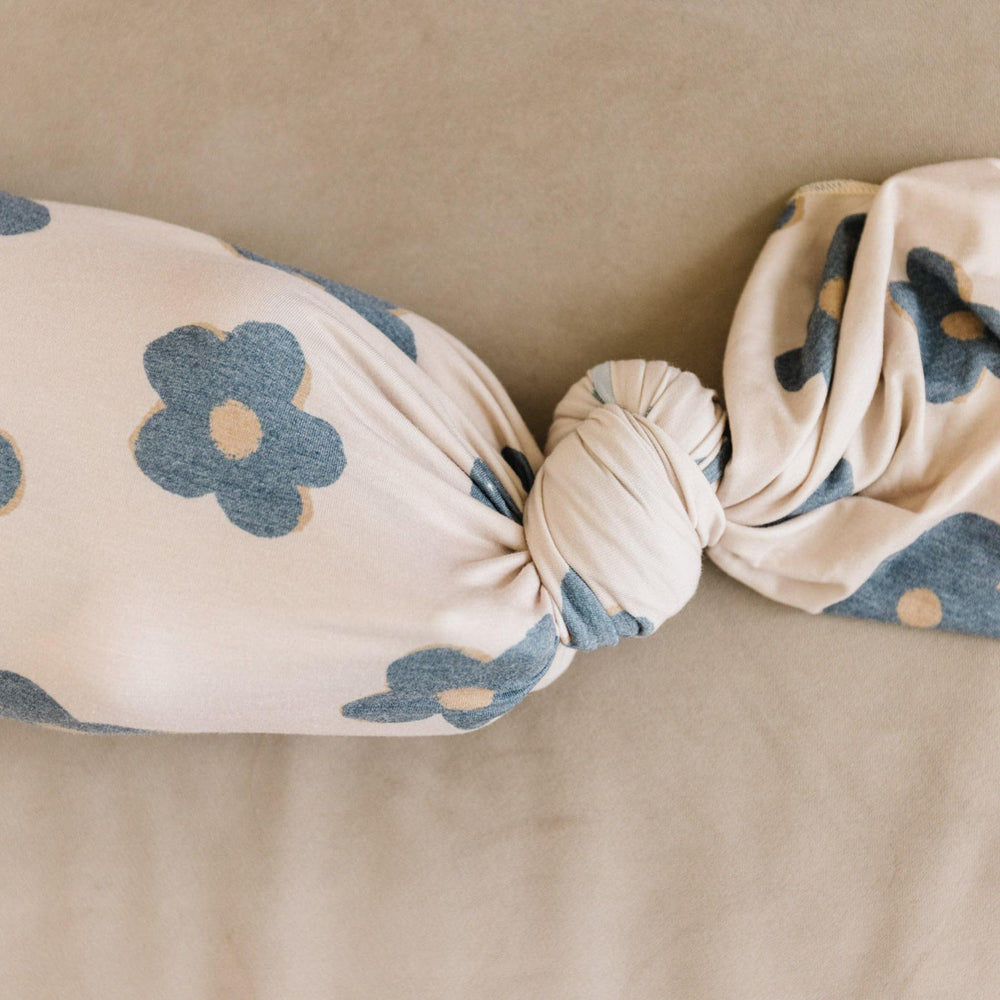 Copper Pearl Gemma Tan swaddle blanket close-up showing soft polyester-rayon blend