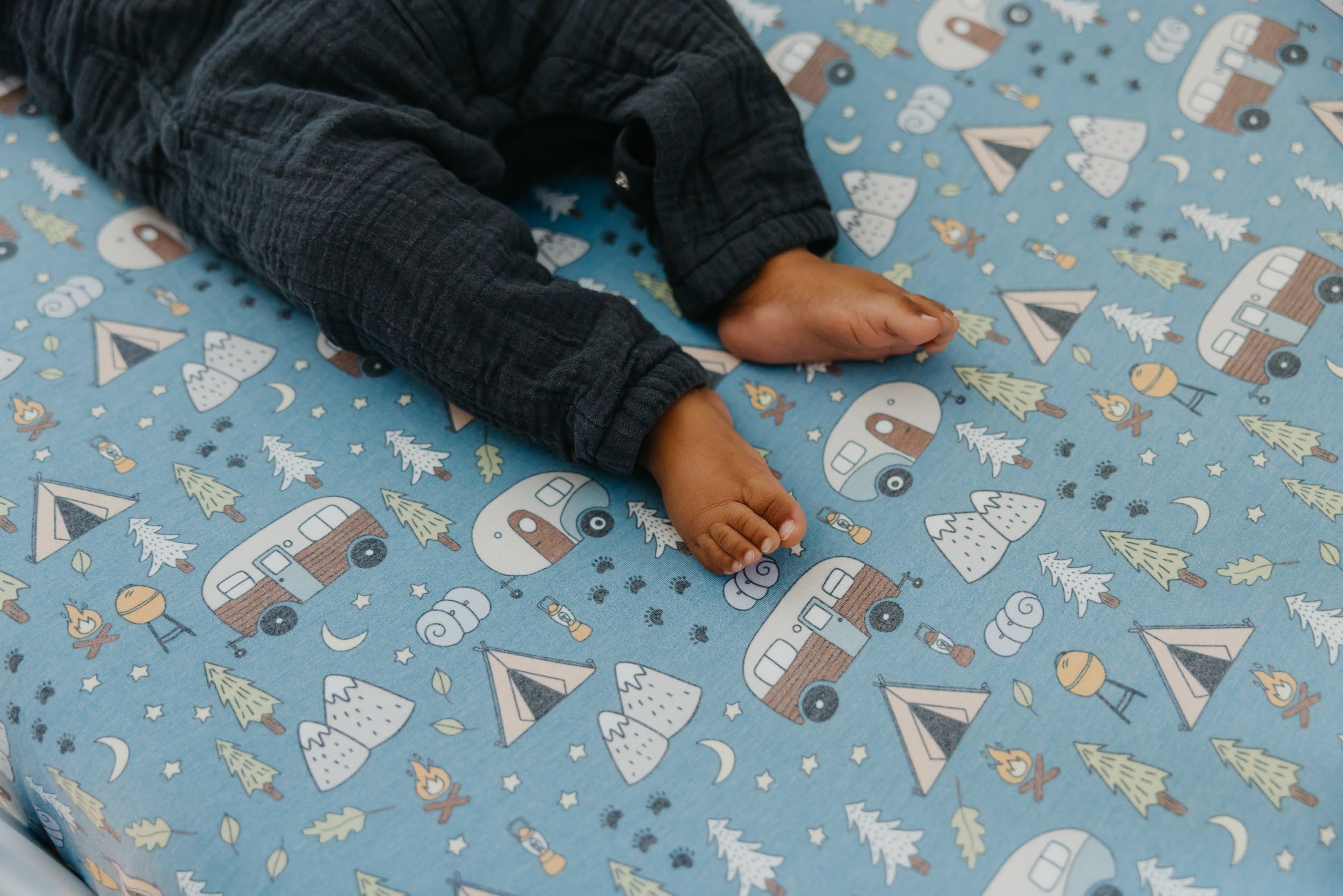 Copper Pearl gender-neutral design crib sheet complements nursery theme.