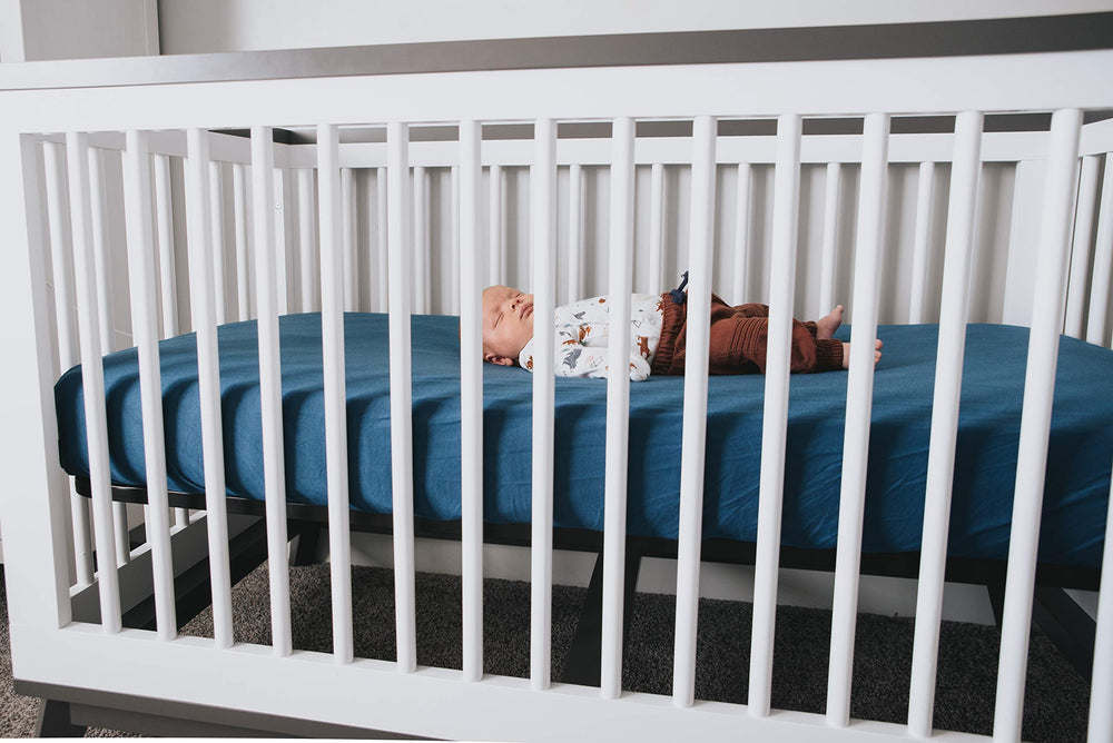 River color packaging that makes Copper Pearl crib sheets gift-ready.