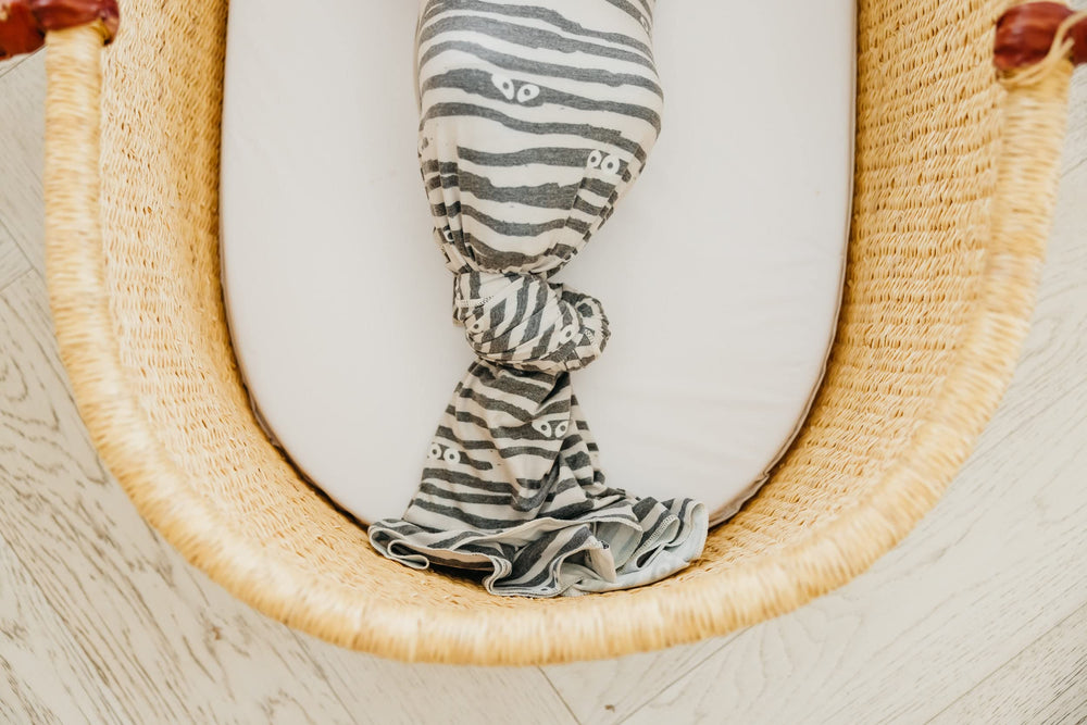 Copper Pearl growth-friendly blanket grows with baby into toddler years