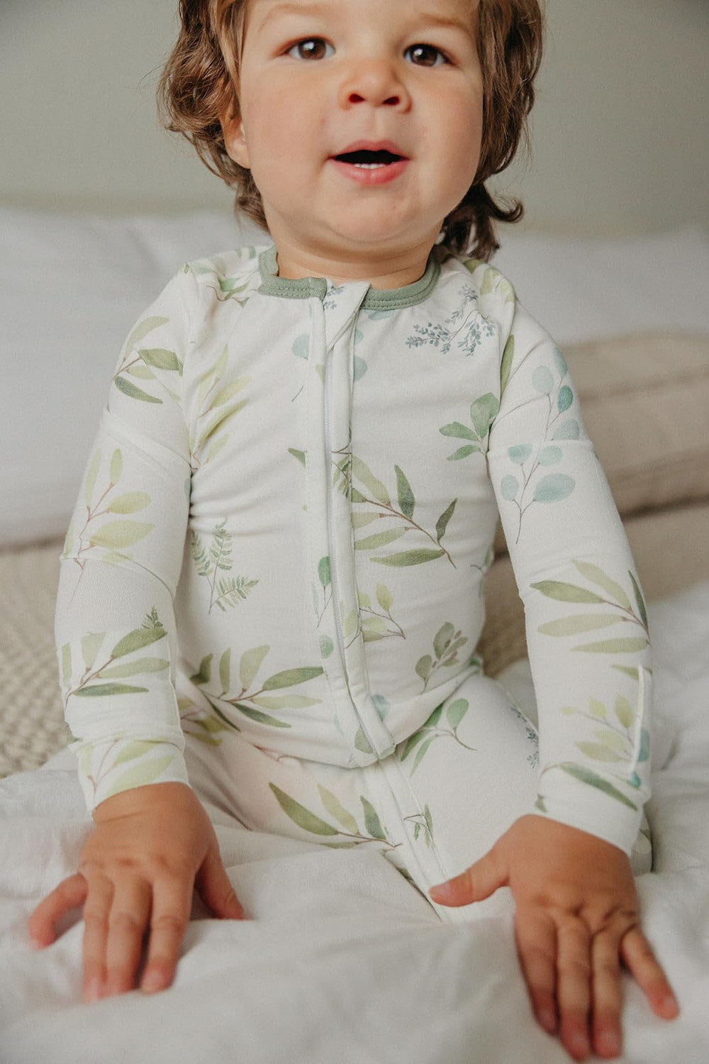 Copper Pearl Haven newborn footie provides a snug, gentle fit.