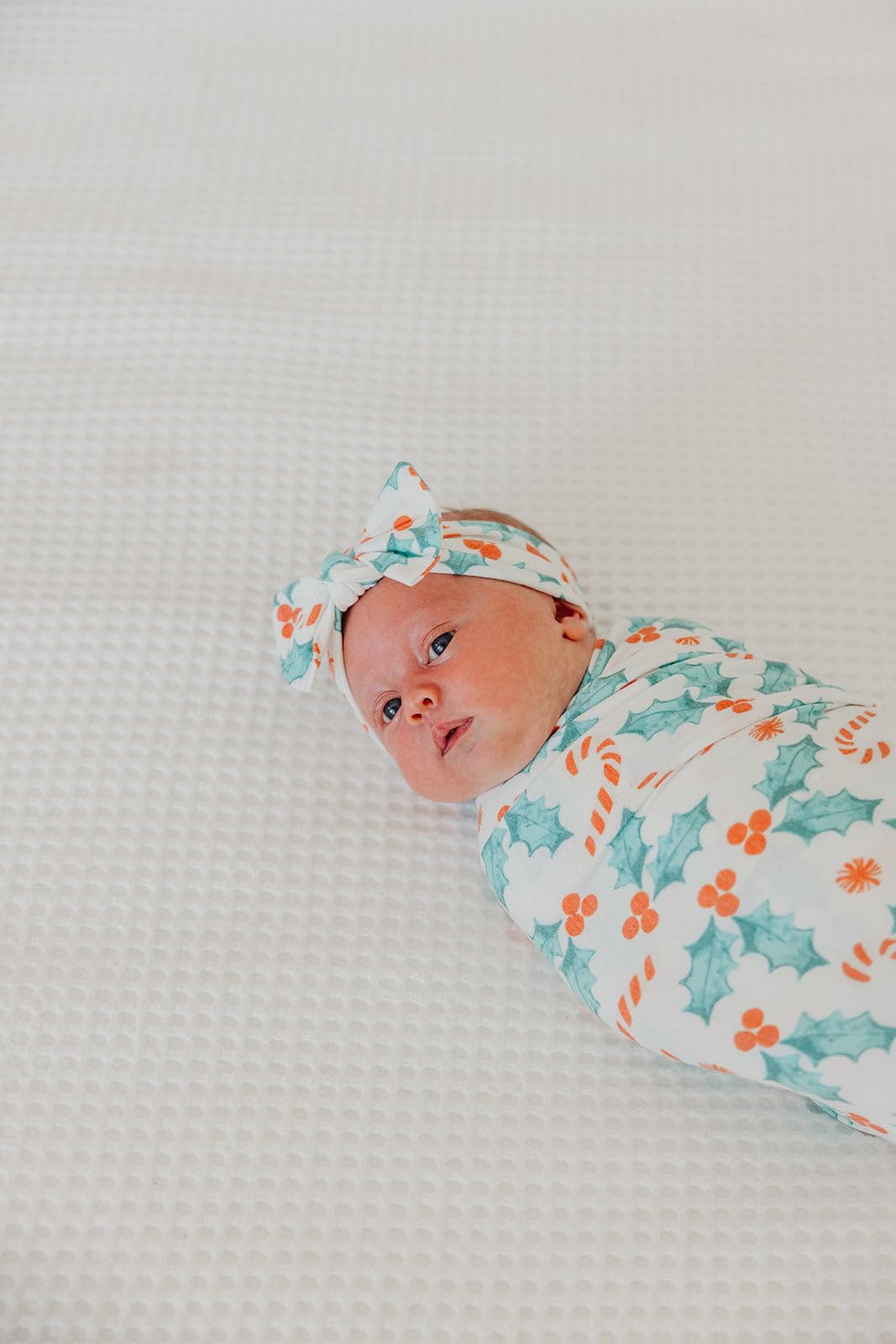 Copper Pearl Holly nursing cover setup with blanket draped