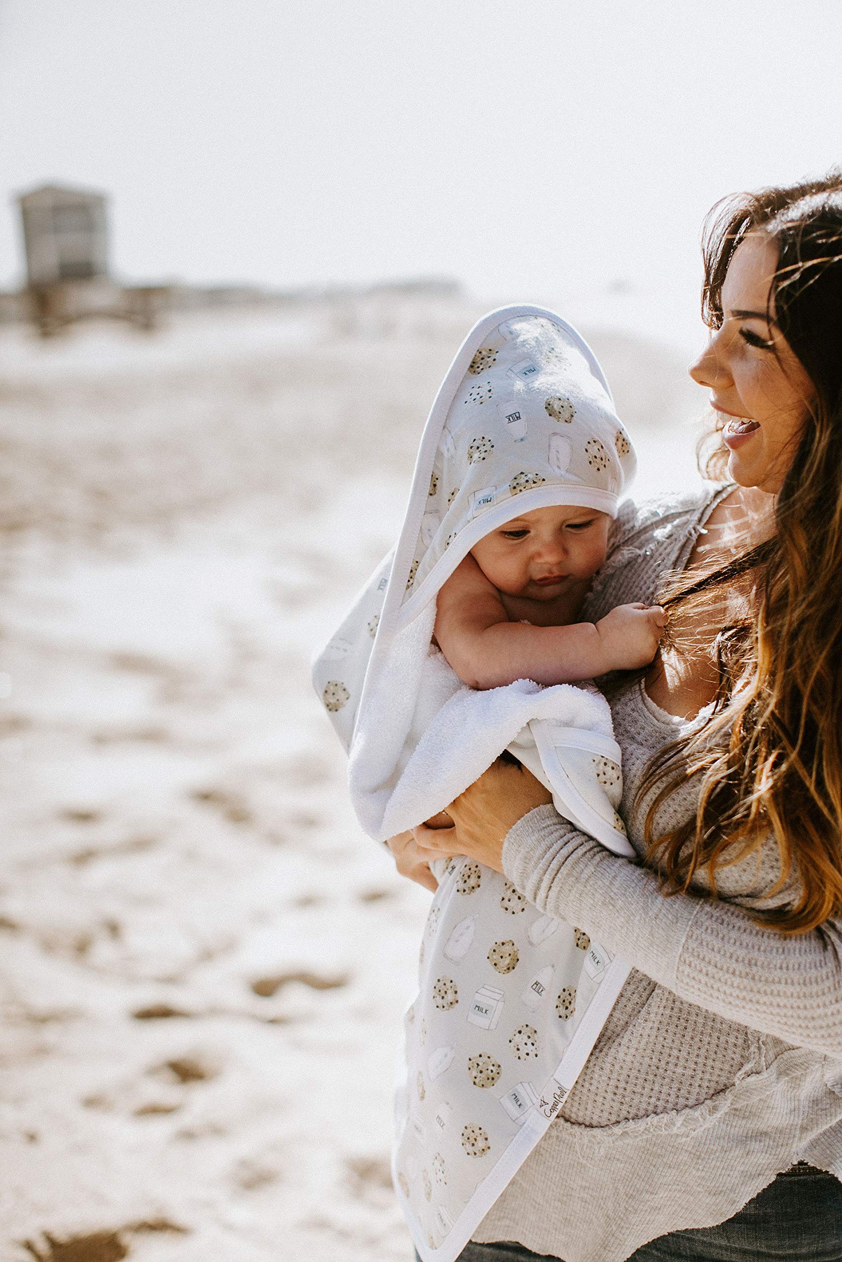 Copper Pearl hooded towel arrives gift-ready for baby showers and celebrations.