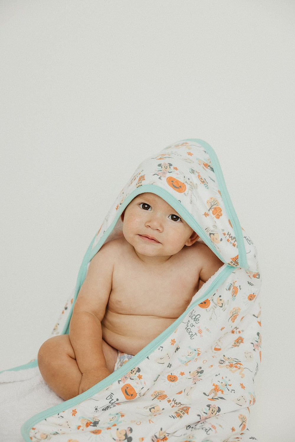 Copper Pearl hooded towel size 33x33 inches enables comfortable use from infancy through toddlerhood.
