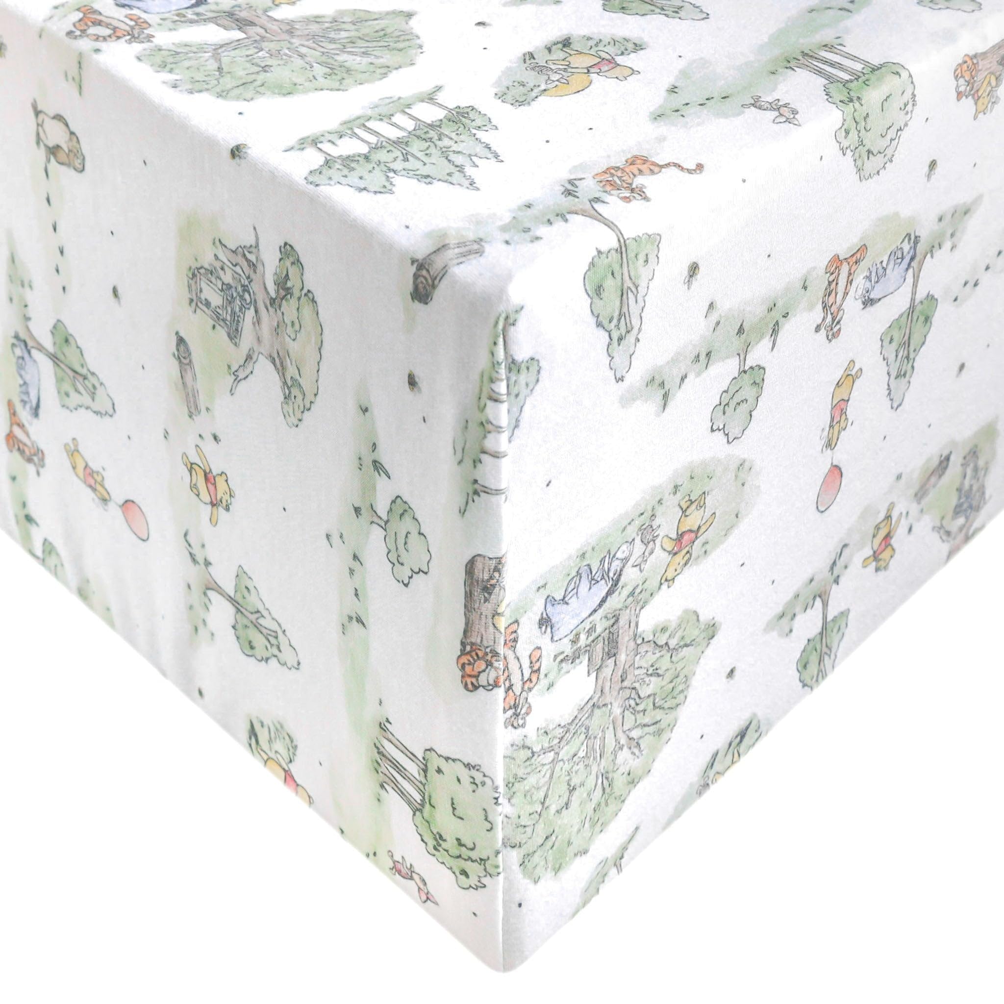Copper Pearl Hundred Acre Wood knit crib sheet shows soft, breathable fabric for a comfy nursery