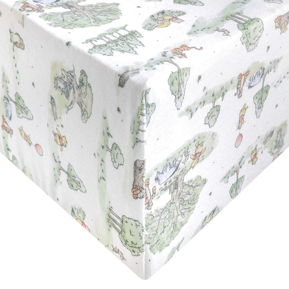 Copper Pearl Hundred Acre Wood knit crib sheet shows soft, breathable fabric for a comfy nursery