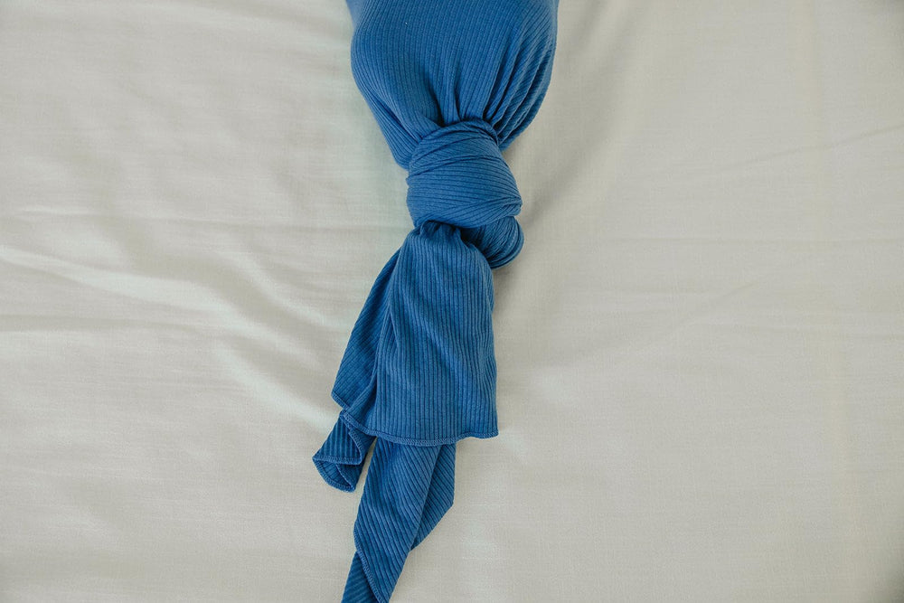 Copper Pearl Indigo swaddle blanket used as nursing cover