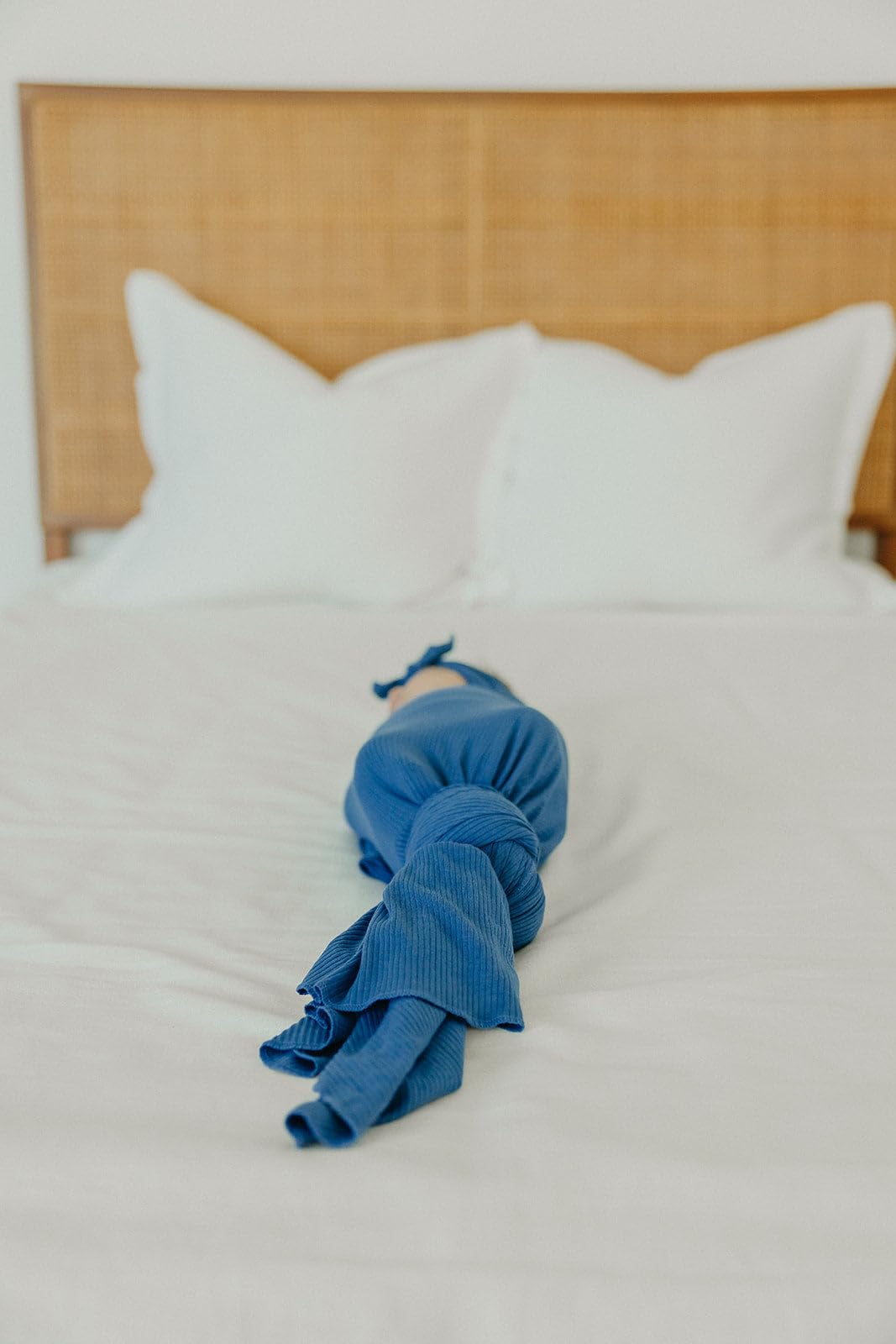 Copper Pearl Indigo swaddle blanket doubles as a stroller shield