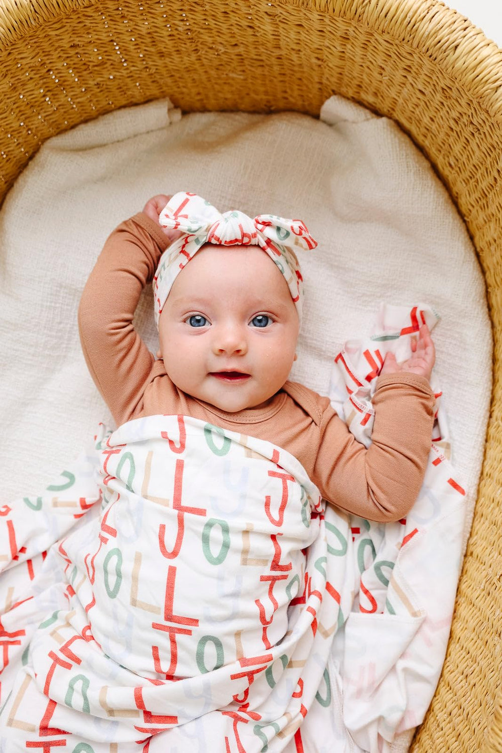 Copper Pearl Jolly swaddle doubles as a playmat for tummy time and beyond