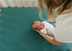 Copper Pearl Journey tight-fit elastic ensures a secure, clean look on standard cribs.