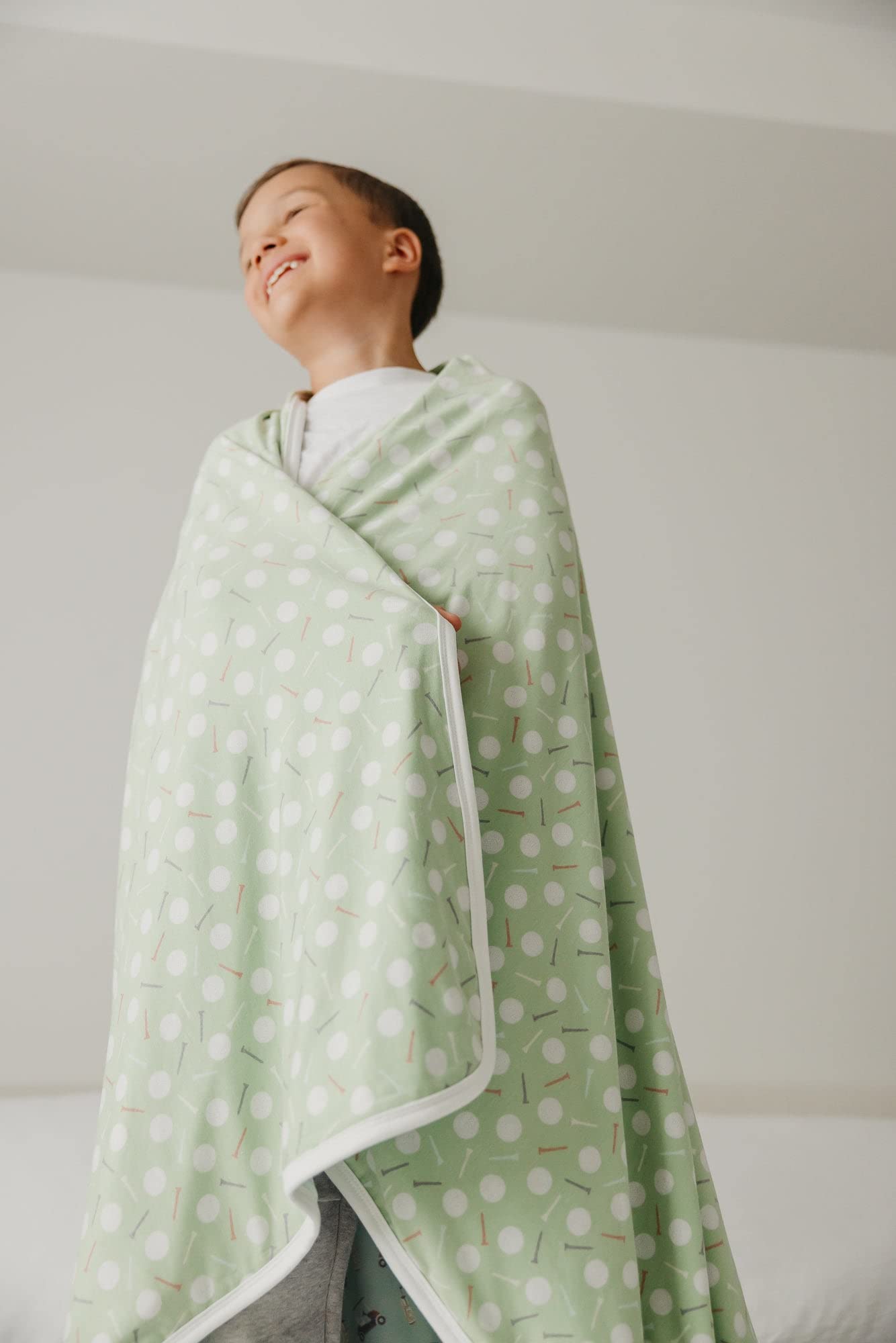 Copper Pearl Jumbo 3-Layer Blanket with signature prints matching nursery decor.