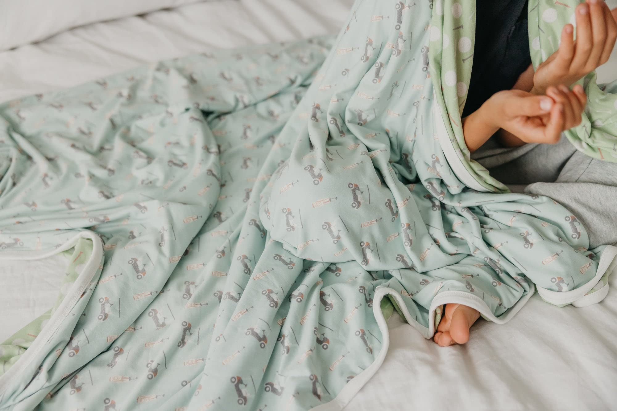Copper Pearl Jumbo 3-Layer Blanket draped on a toddler bed demonstrating cozy coverage.