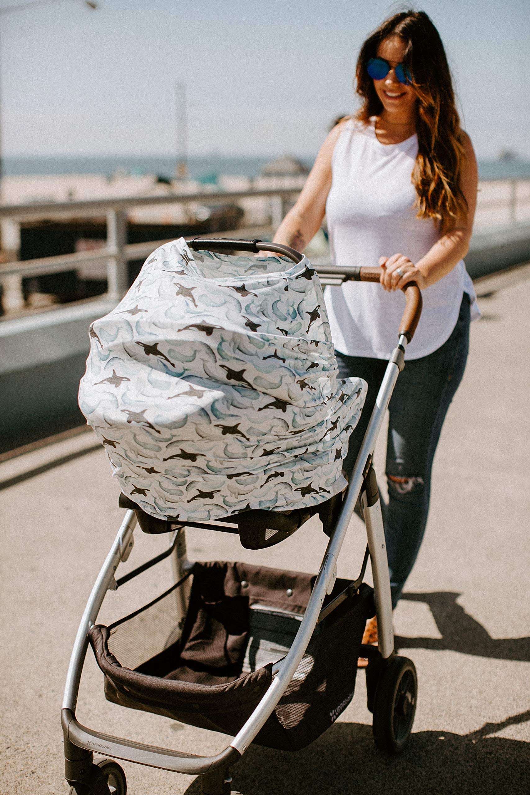 Copper Pearl Kai cover on high chair for clean, easy dining out