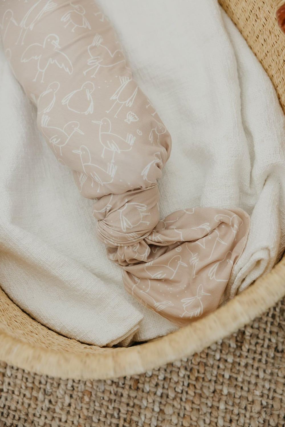Copper Pearl knit blanket swaddle is great for tummy time and play.