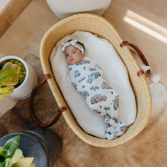 Copper Pearl knit headband offers gentle stretch to grow with baby through early months.