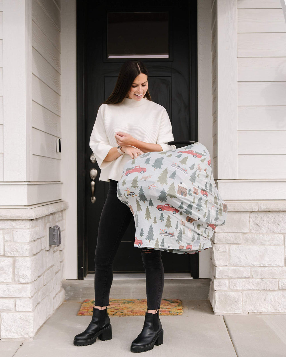 Copper Pearl Kringle shopping cart cover in use protects baby during shopping