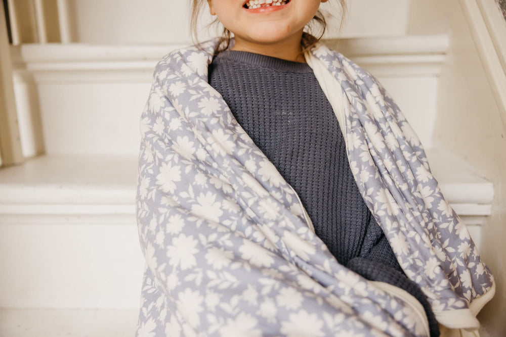 Copper Pearl Lacie blanket in stroller for light warmth during outings.